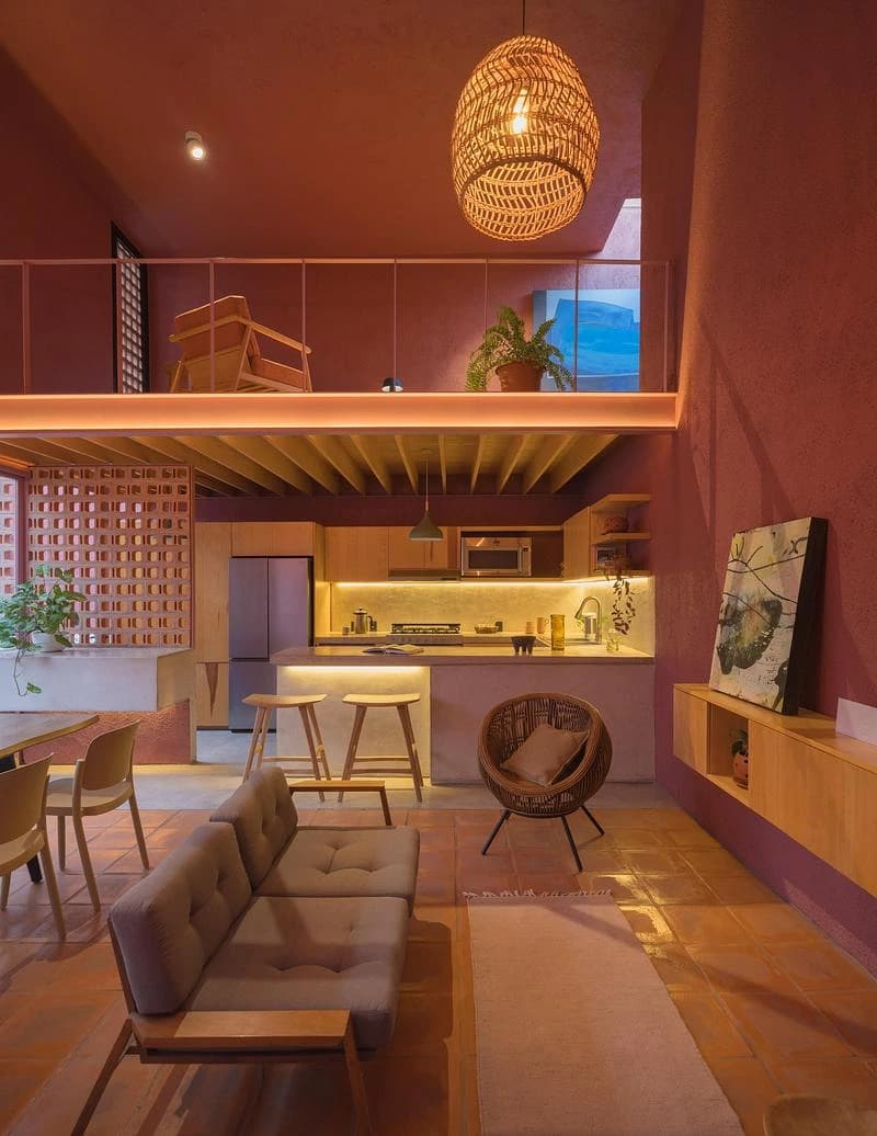 Double-height living space with a mezzanine and kitchen · LGM Studio · via v2com