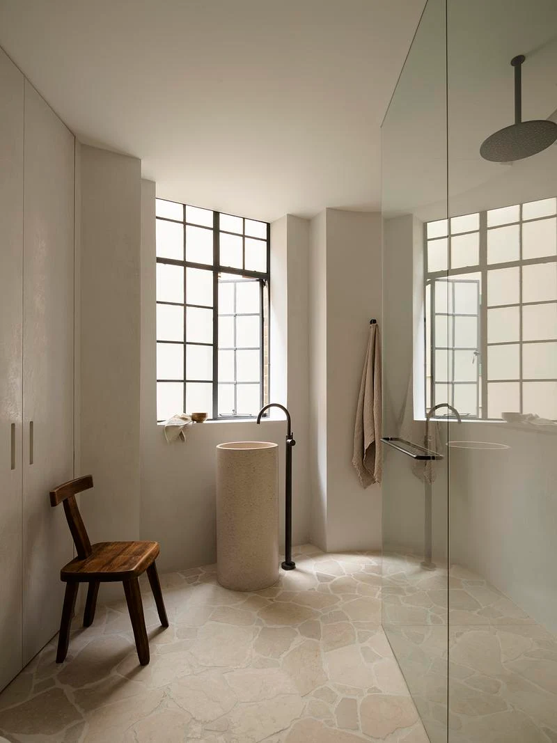 Bathing space framed by steel windows · Anson Smart · via v2com