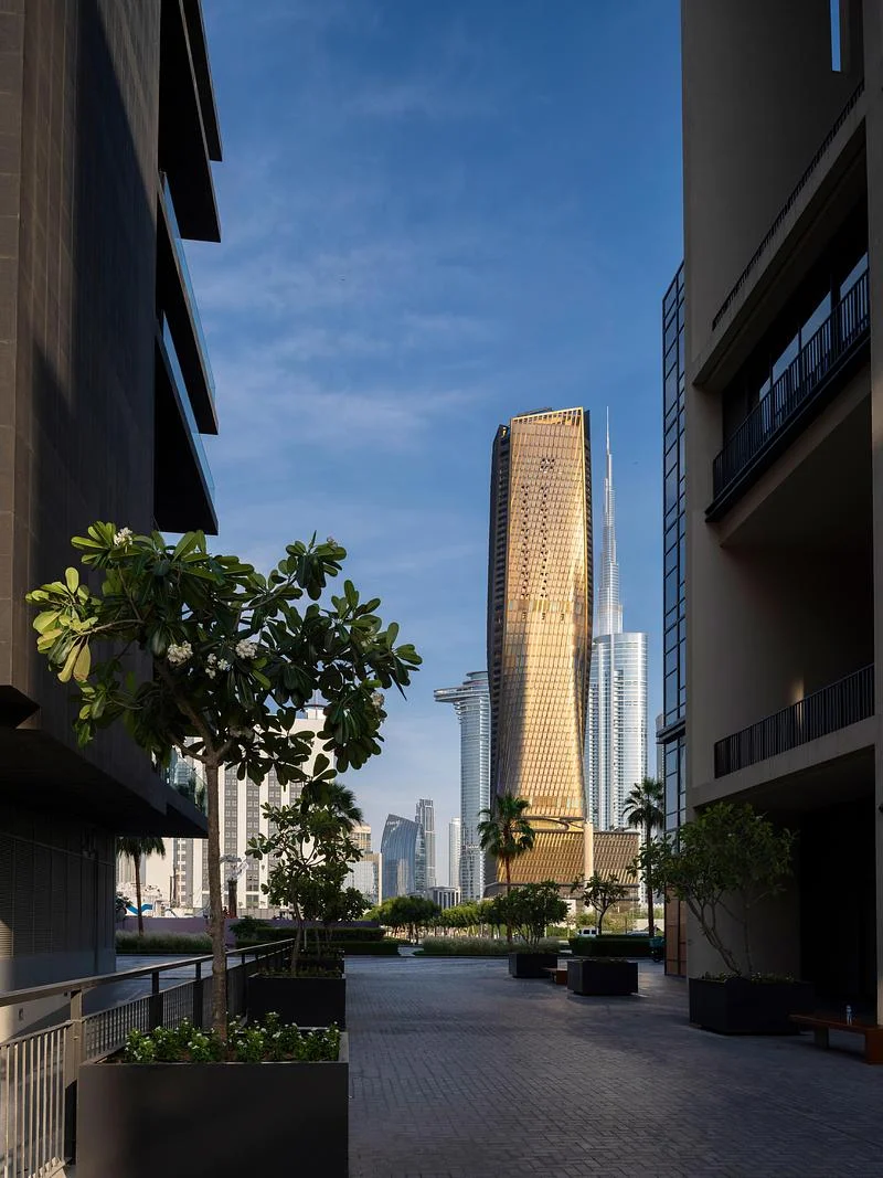 The tower framed by neighbouring buildings · Johnseye Photography · via v2com