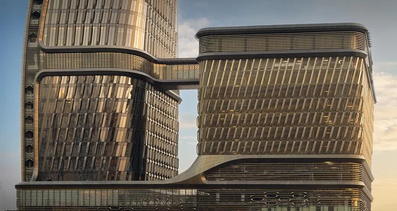 The tower and podium seen together · Ahmad Alnaji - SARAB · via v2com