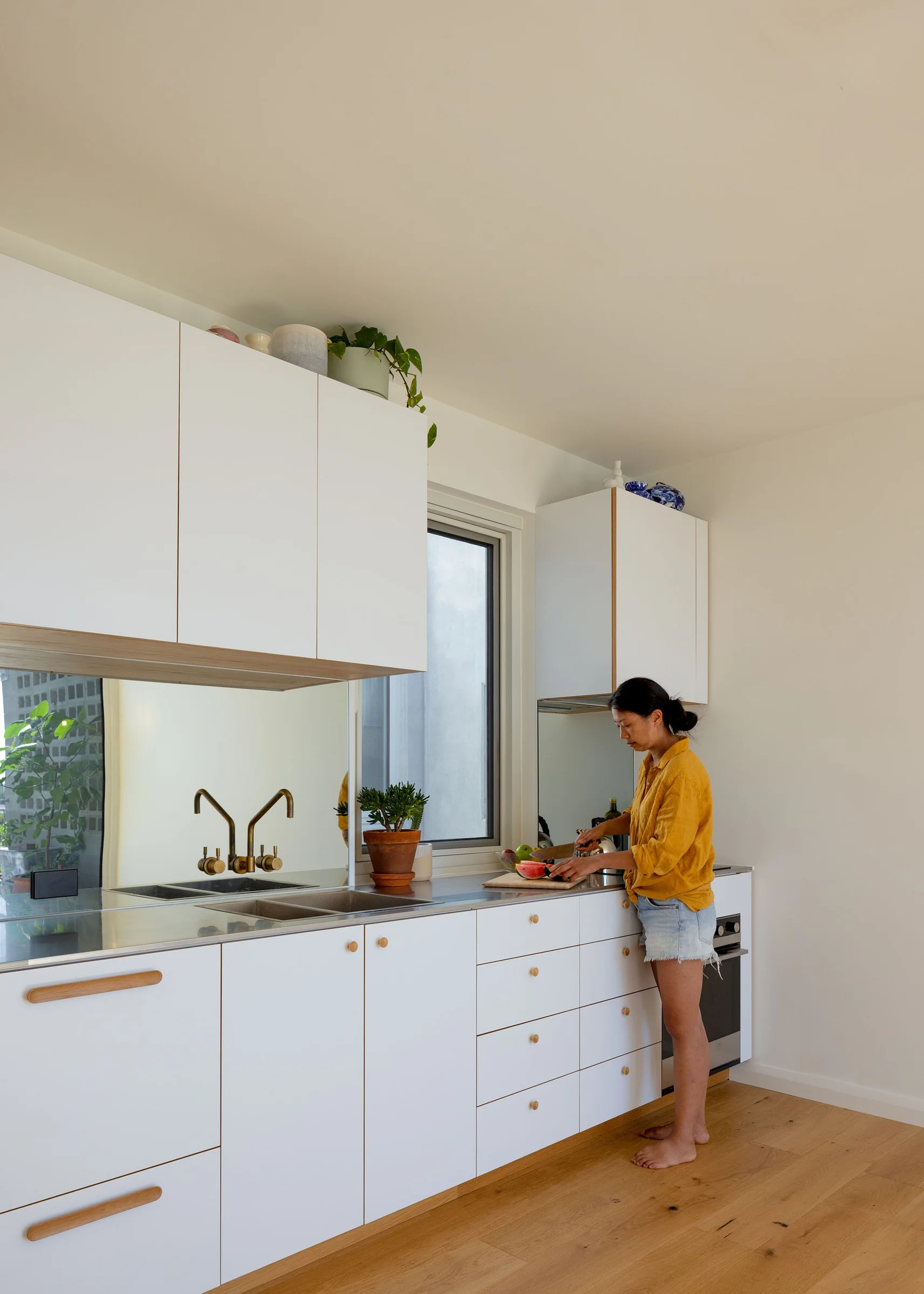 Kitchen and living space at Terrace House · Photography © Maitreya Chandorkar