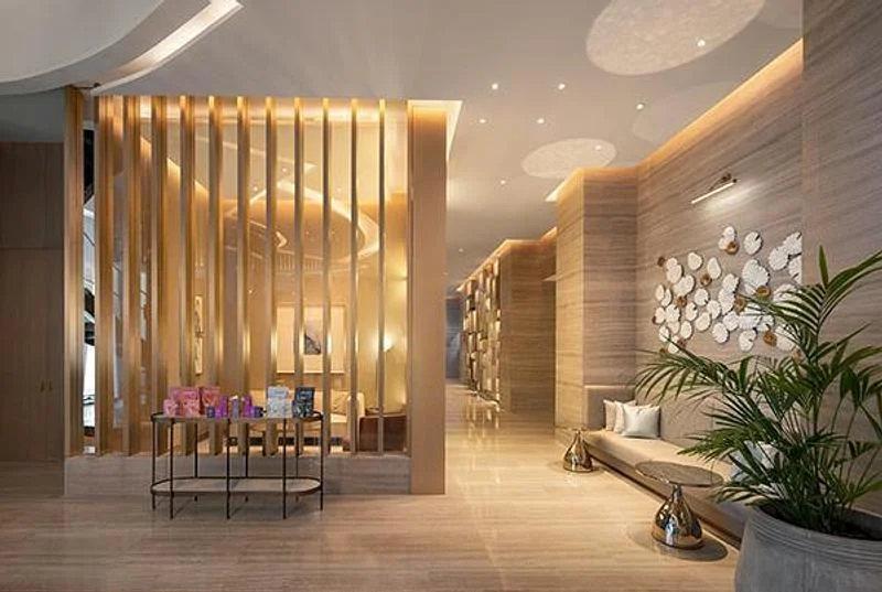 Warm lighting and sculptural details in the hotel interior · Ahmad Alnaji - SARAB · via v2com