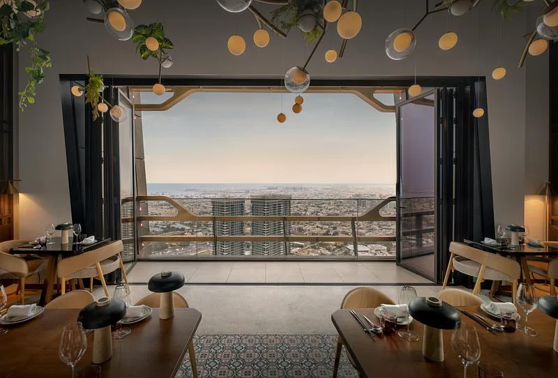 A hotel room opening towards the city · Ahmad Alnaji - SARAB · via v2com