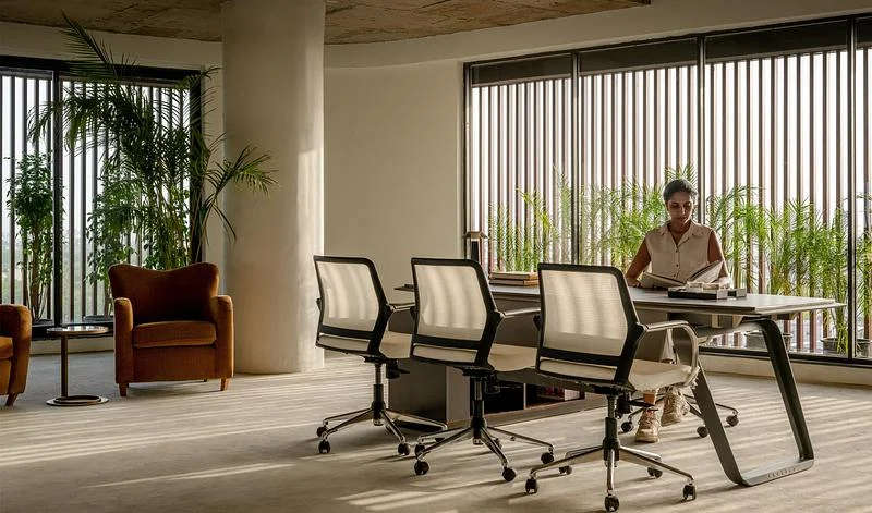 Meeting room looking towards a planted terrace · Vinay Panjwani · via v2com