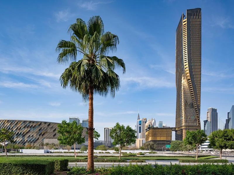 Wasl Tower beyond a palm-lined foreground · Johnseye Photography · via v2com
