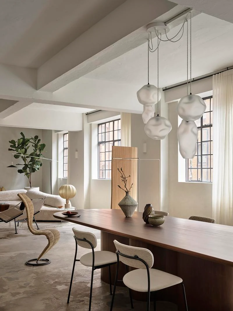 Dining table beside the industrial windows · Anson Smart · via v2com