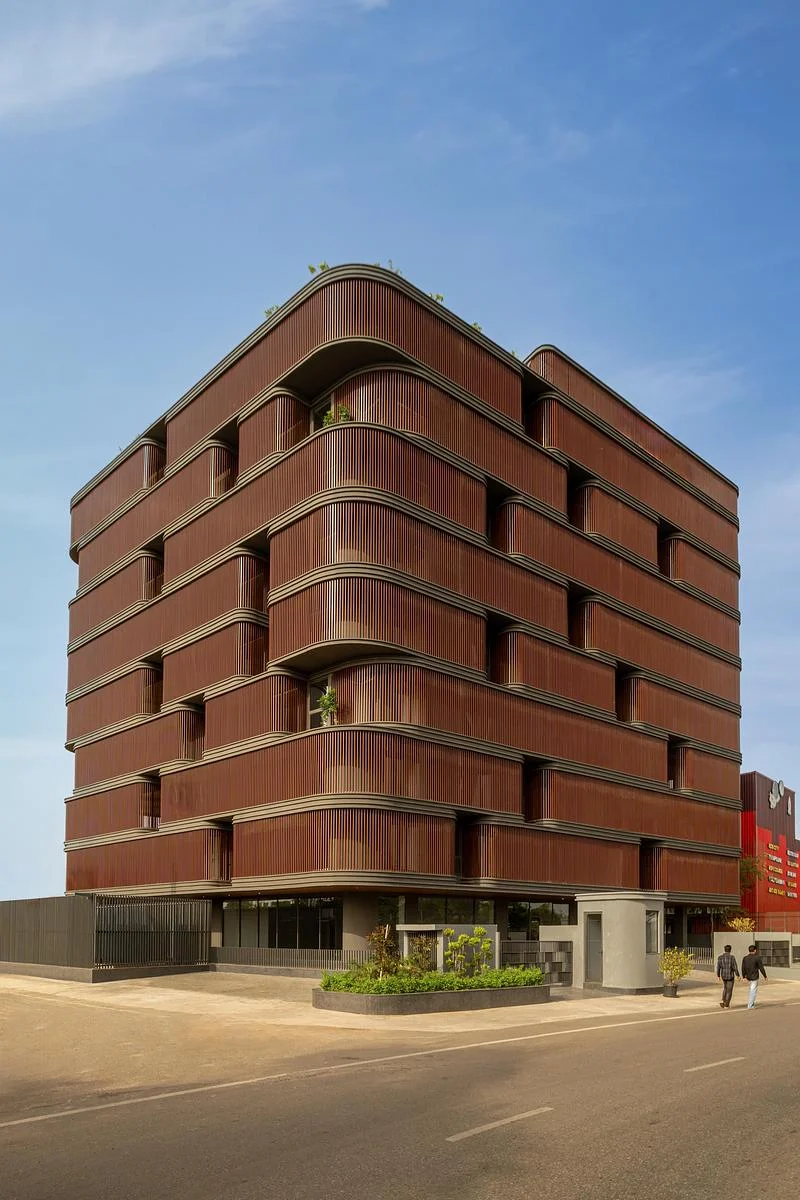 The building beside the adjoining road · Vinay Panjwani · via v2com